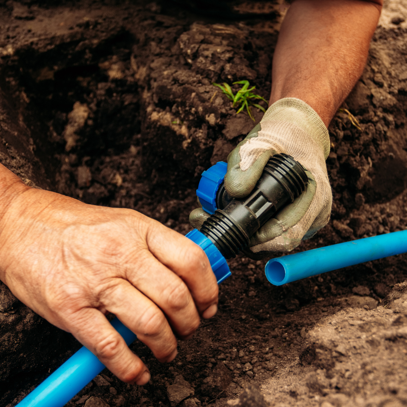Professional installation of underground irrigation system by Georgia Roots Landscaping, ensuring durable and efficient water delivery.